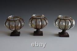 A Set Of 3 Antique Patinated Metal & Glass Pumpkin Lanterns