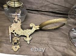 Antique 1876 kerosene Eagle lamp withornate wall bracket and 8 mercury reflector