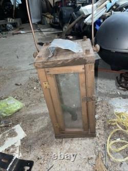 Vintage or antique wooden candle lantern