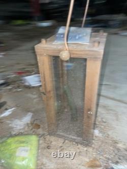 Vintage or antique wooden candle lantern