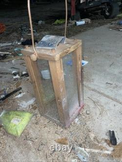 Vintage or antique wooden candle lantern