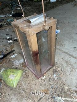 Vintage or antique wooden candle lantern
